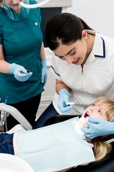 Professional dentist performing a dental procedure