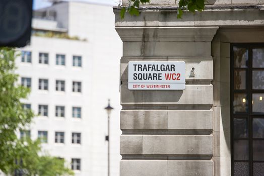 LONDON, UK - JUNE 15: Detail of Trafalgar Square street sign. June 15, 2015 in London. Trafalgar Square is at the heart of the city and is a popular tourist attraction.