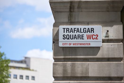 LONDON, UK - JUNE 15: Detail of Trafalgar Square street sign. June 15, 2015 in London. Trafalgar Square is at the heart of the city and is a popular tourist attraction.
