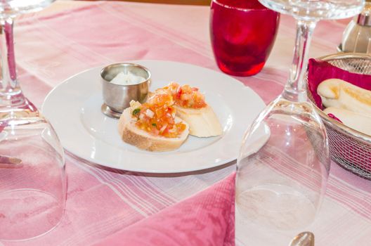 Bruschetta appetizer in a typical Italian pizzeria.