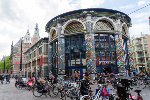 The Hague, Netherlands - May 8, 2015: People shopping on venestraat shopping street in The Hague, Netherlands. on  May 8, 2015. The Hague is the capital city of the province of South Netherlands. With a population of 515,880 inhabitants.