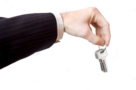 Hand and key conceptual image. Businessman hold the keys.