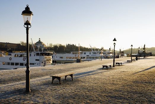 Stockholms embankment with a lamps.