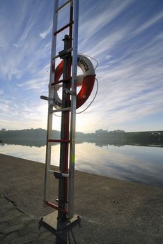 Lifebouy against blue sky.