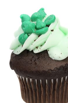 Close up of green cupcake on white background