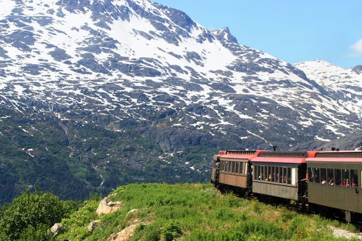 Old train traveling near cliff