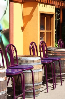 Outdoor wine tasting on old barrels