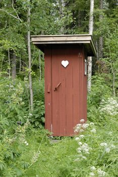 A Swedish red outhouse.