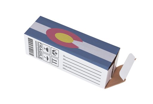 Concept of export, opened paper box - Product of Colorado