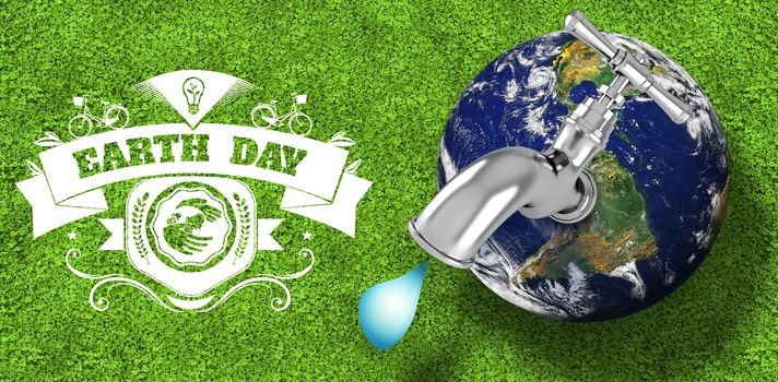 Earth with faucet against astro turf surface