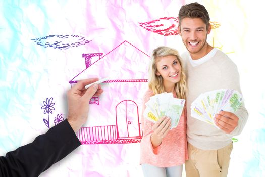 Attractive couple flashing their cash against crumpled white page 