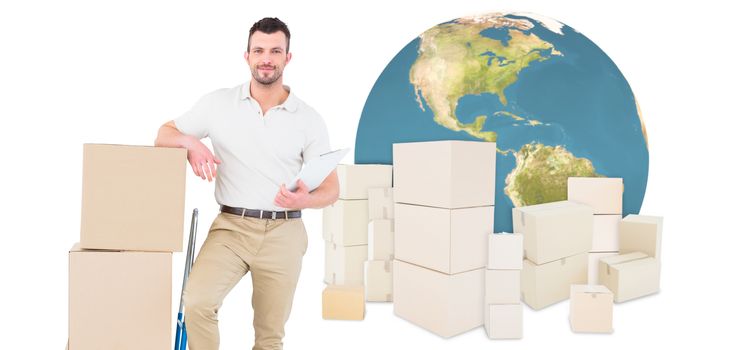 Confident delivery man with cardboard boxes  against logistics concept