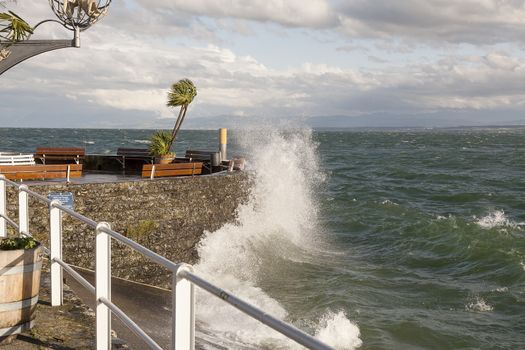 Waves hitting the stones on a stormy day at Bodensee, Germany