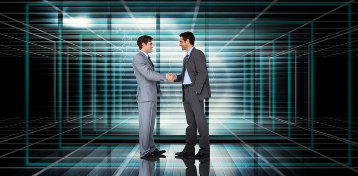 Businessmen shaking hands against abstract technology background