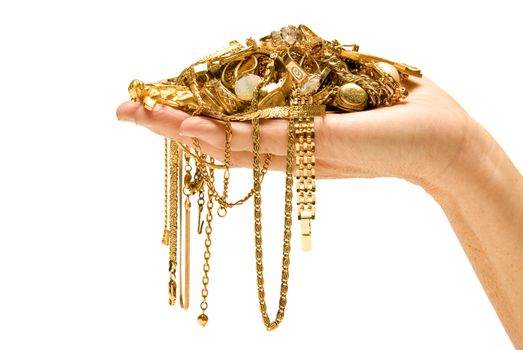Horizontal shot of hand holding expensive beautiful gold jewelry isolated on a white background.