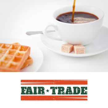 Fair Trade graphic against waffles sugar and a cup of coffee on white plate