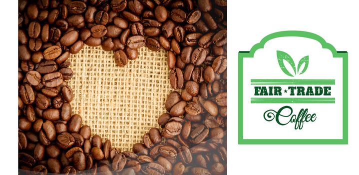 Fair Trade graphic against heart indent in coffee beans