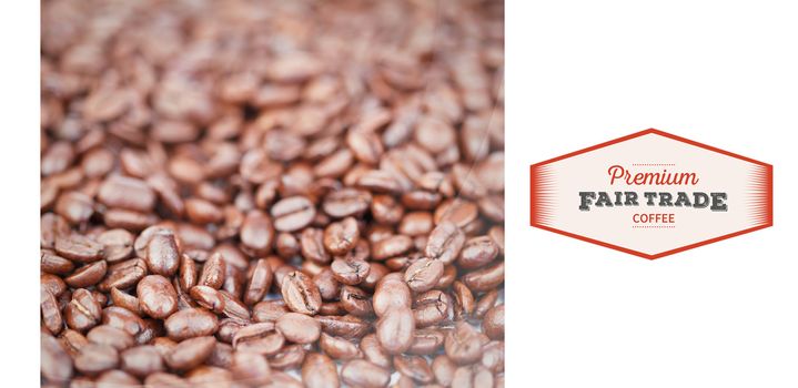 Fair Trade graphic against coffee beans 