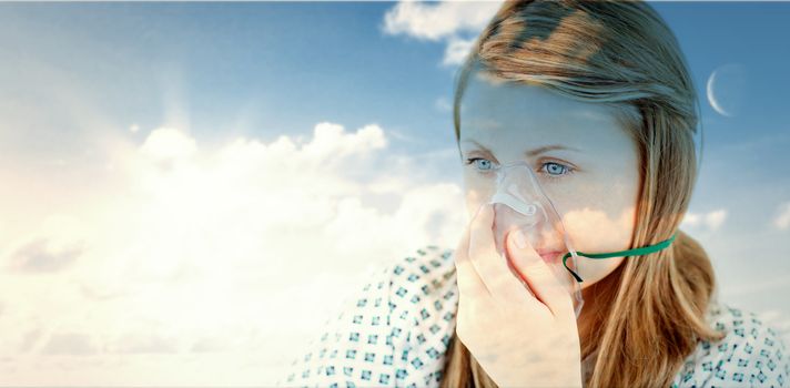 blue sky against female young patient with a mask 