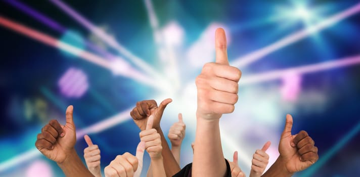Hands showing thumbs up against digitally generated laser lights background