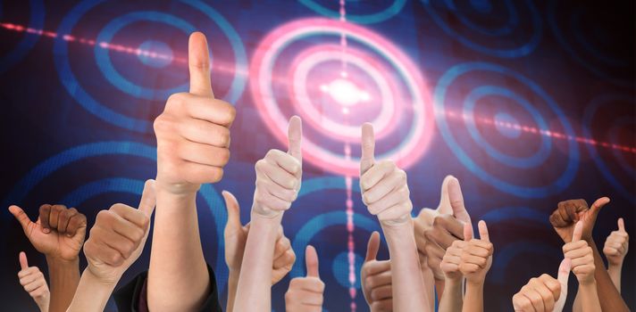 Hands showing thumbs up against digital target over computing design
