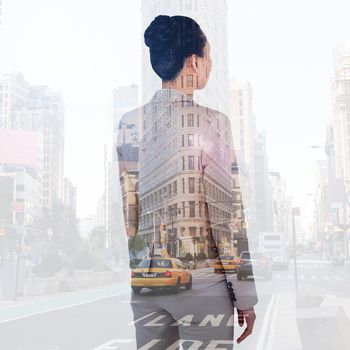 Asian businesswoman against new york street