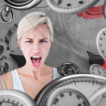 Angry blonde woman screaming  against grey background