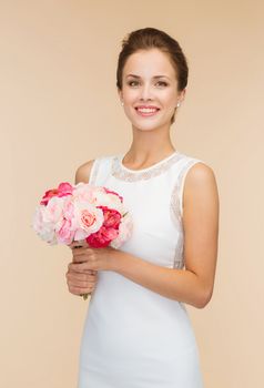 happiness, wedding, holidays and celebration concept - smiling bride or bridesmaid in white dress with bouquet of flowers