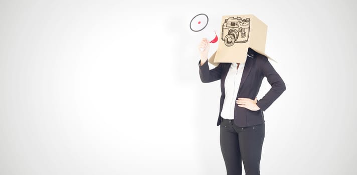 Anonymous businesswoman holding a megaphone against white background with vignette