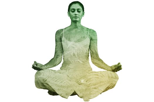 Peaceful woman in white sitting in lotus pose against autumnal ferns