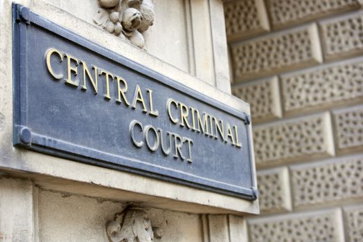 LONDON, UK - JUNE 23: Detail of Central Criminal Court plaque outside the building. June 23, 2015 in London.