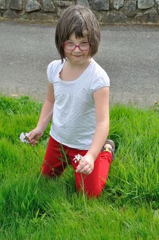 Girl picking flowers