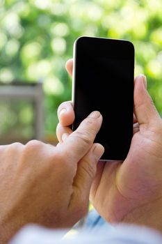 Close up image of man checking his phone background