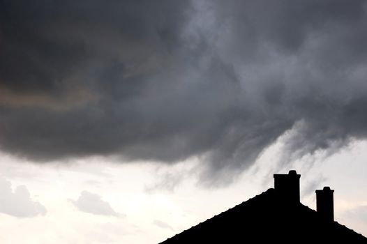 Dramatic storm over the detached house.