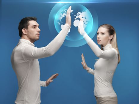future, technology, business, education and people concept - man and woman working with globe hologram
