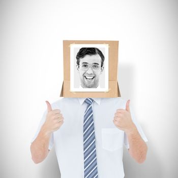 Businessman with photo box on head against white background with vignette