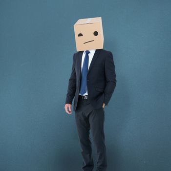 Anonymous businessman against blue background