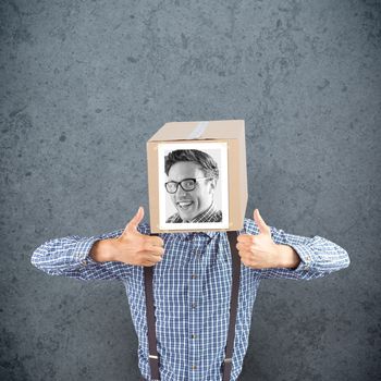 Businessman with photo box on head against dirty old wall background