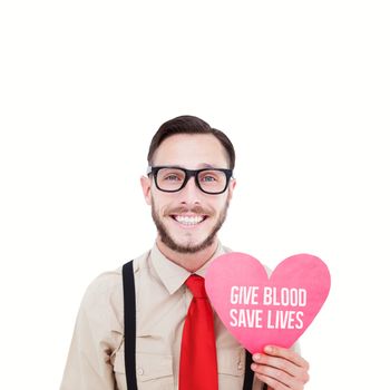 Geeky hipster smiling and holding heart card against give blood save lives