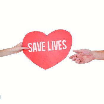 Woman giving heart card to her boyfriend  against save lives