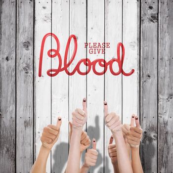 Blood donation against digitally generated grey wooden planks