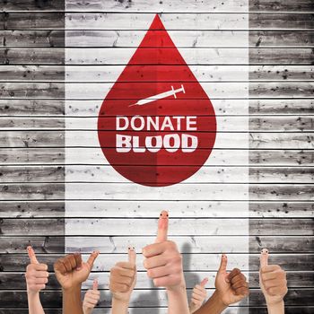 Donate blood against wooden planks background
