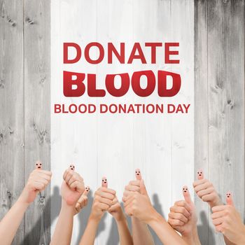 Blood donation against wooden planks