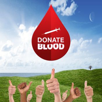 Donate blood against green field under blue sky