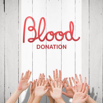 Blood donation against white wood