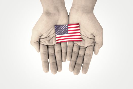Hands showing against usa national flag