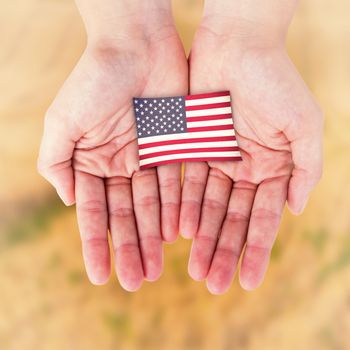 Hands showing against rural fields