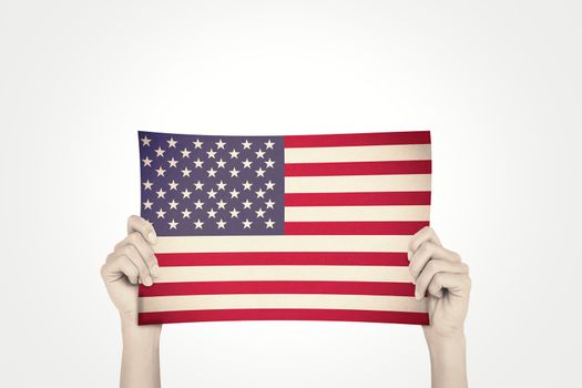 Hand showing card against usa national flag
