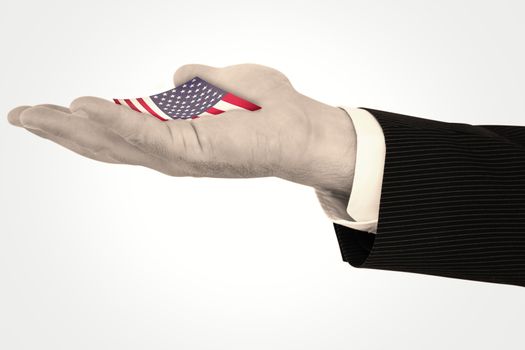 Businessman with wrist watch and hands out against usa national flag