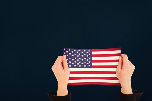 Hands showing against blue background